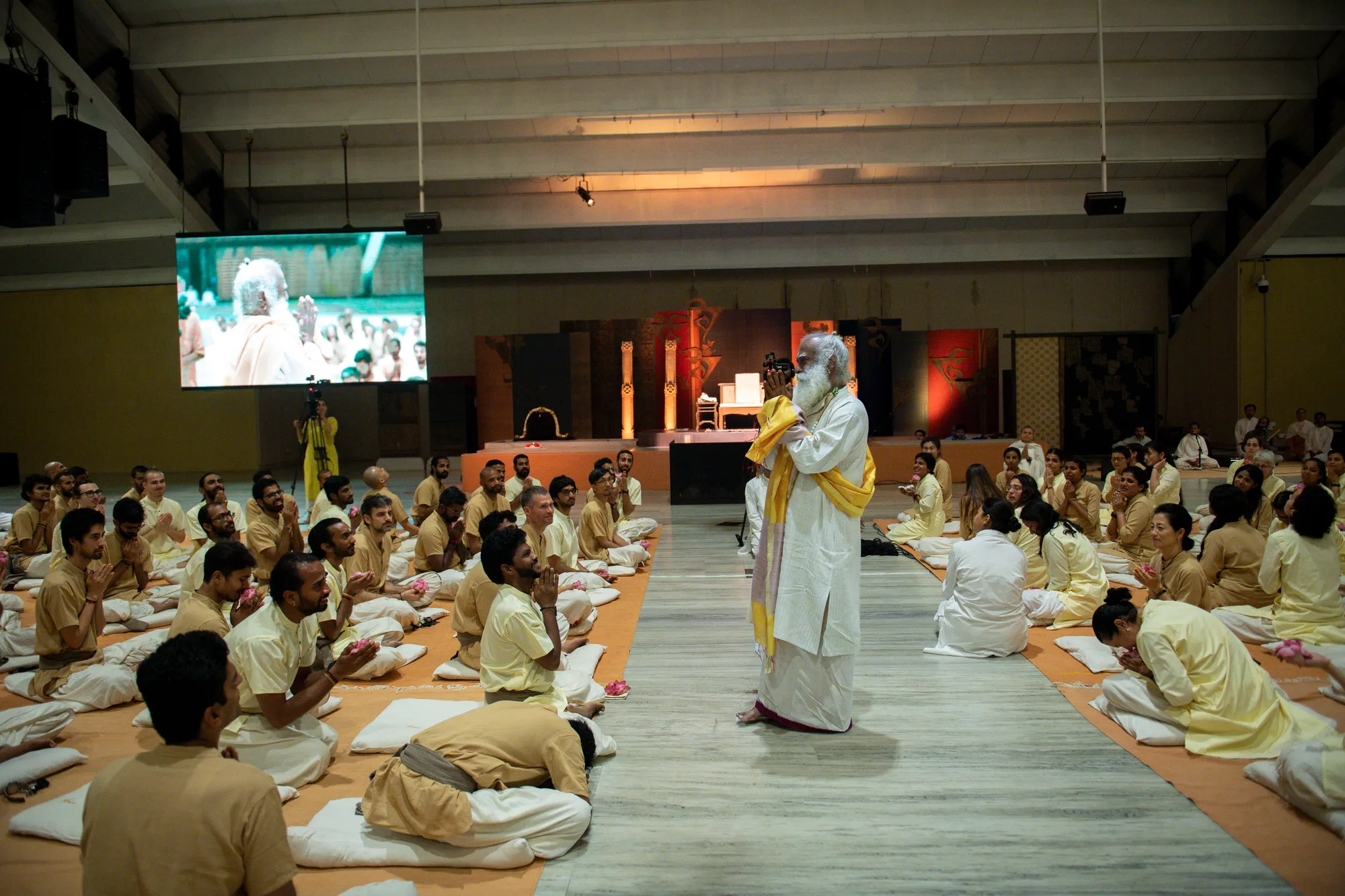 Trainees seated in rows at Sadhguru Gurukulam during a Classical Hatha Yoga teacher-training session.